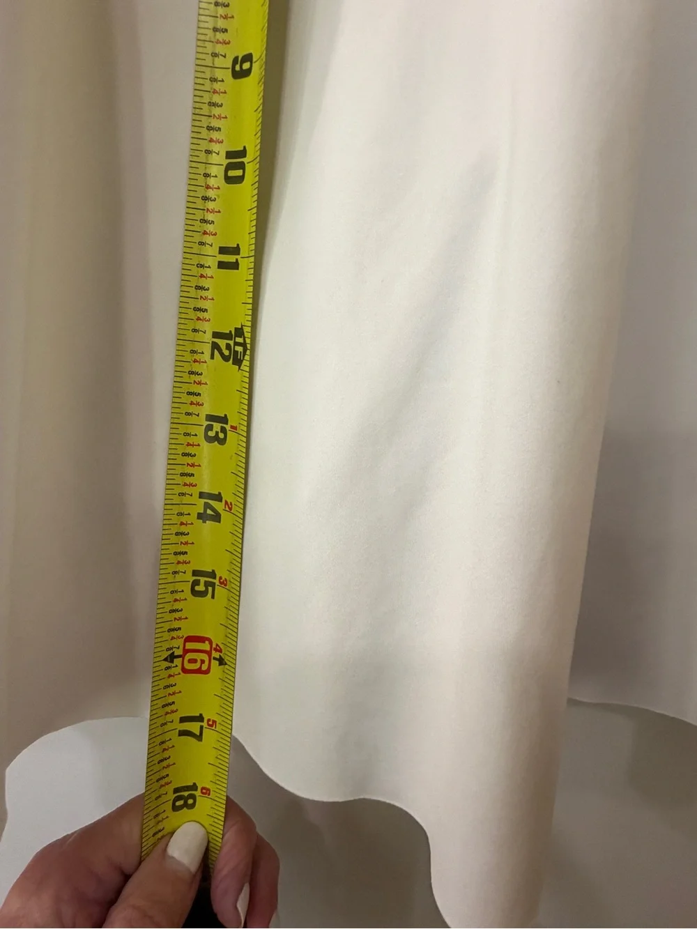 Athleta White Mini Skirt with Slight Flare, pockets on each side.